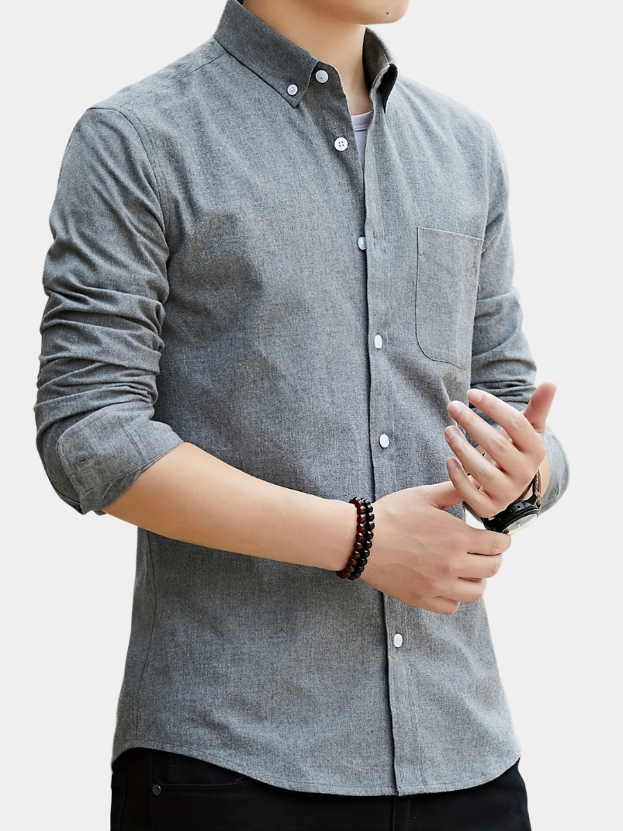 Chemise unie manches longues à poche poitrine