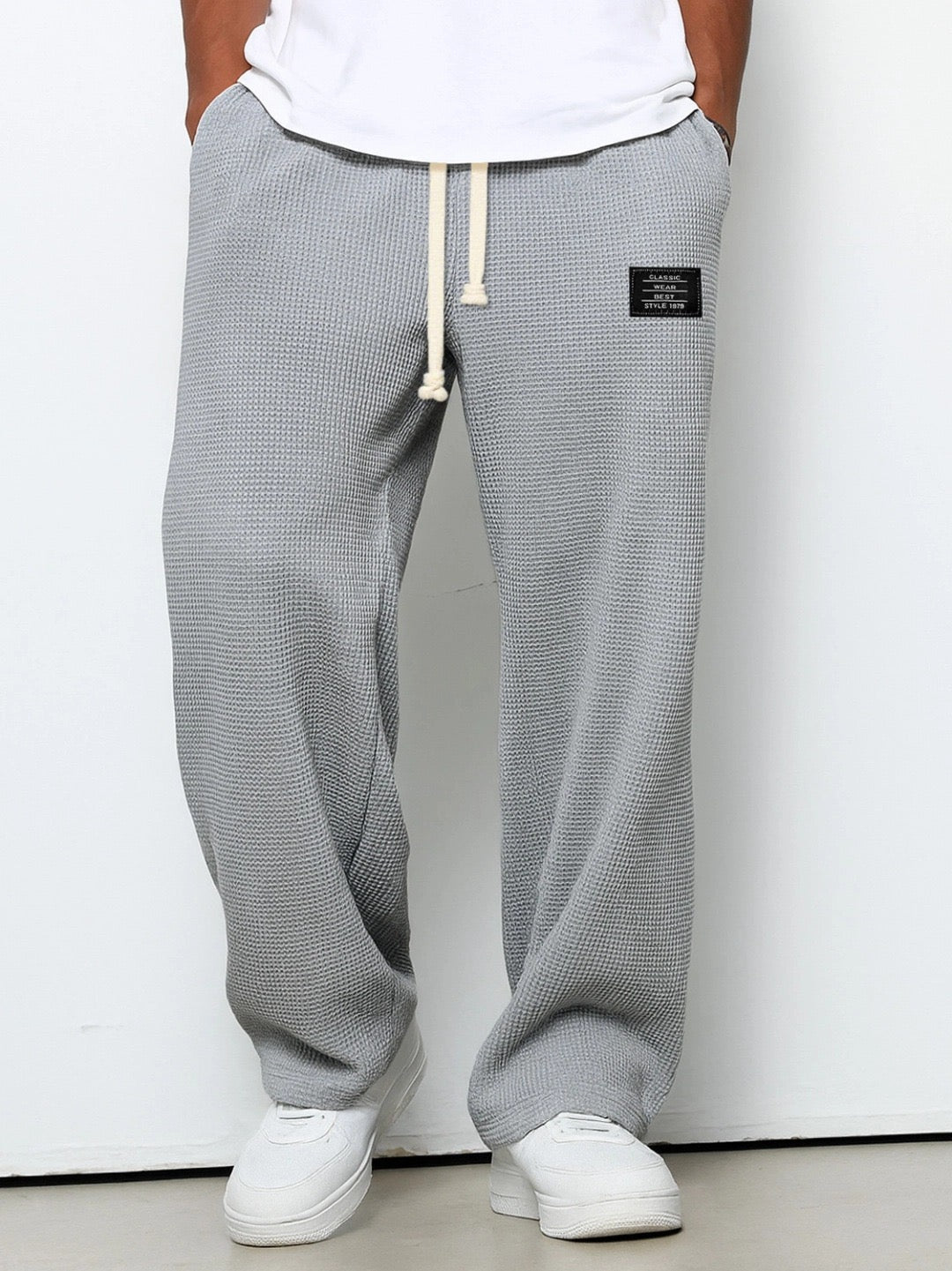 Pantalon décontracté à cordon en tissu texturé