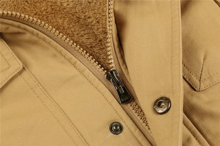 Veste multipoches doublure peluche à capuche