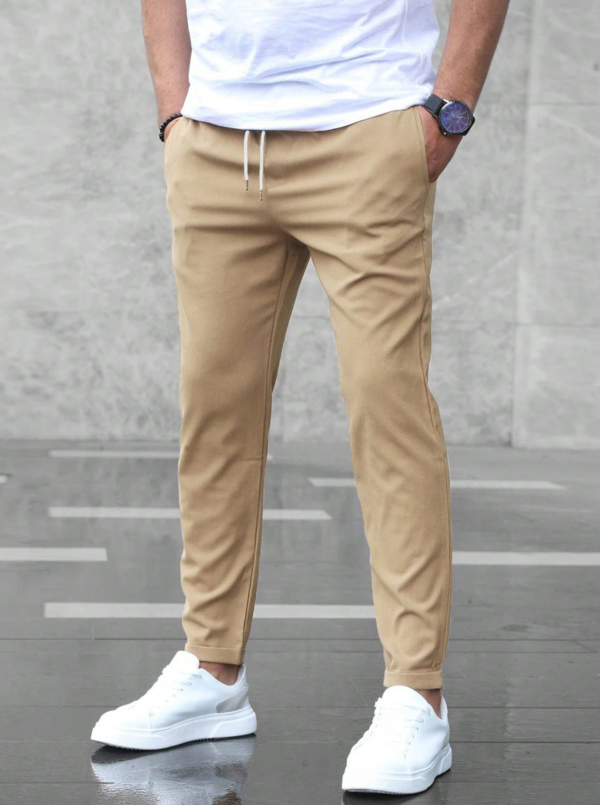 Pantalon taille élastique à cordon coupe fuselée kaki homme, vue de face