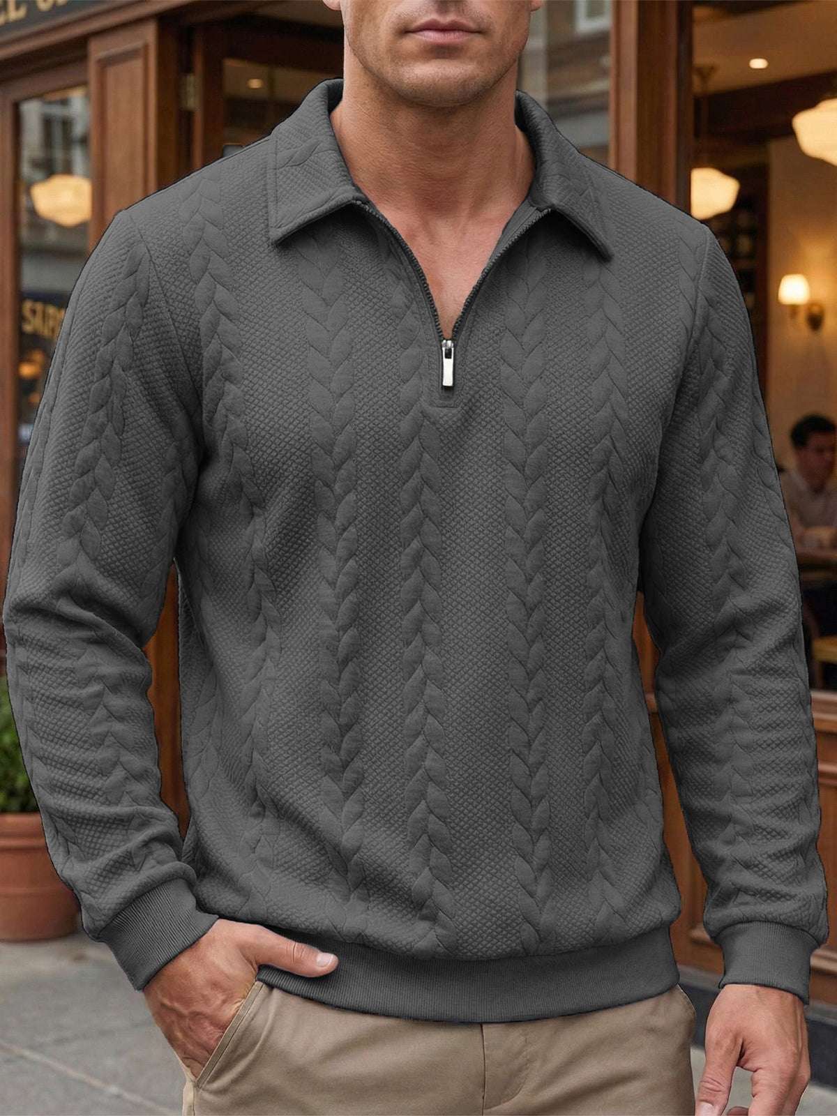 Polo en maille texturée à col zippé