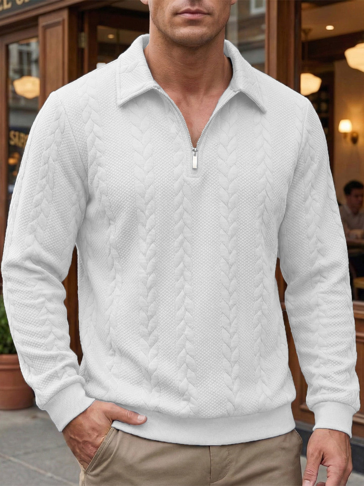 Polo en maille texturée à col zippé
