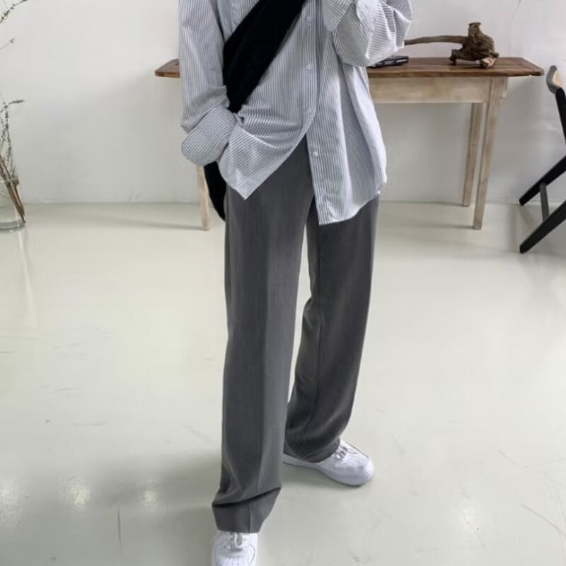 Pantalon habillé à plis coupe ajustée