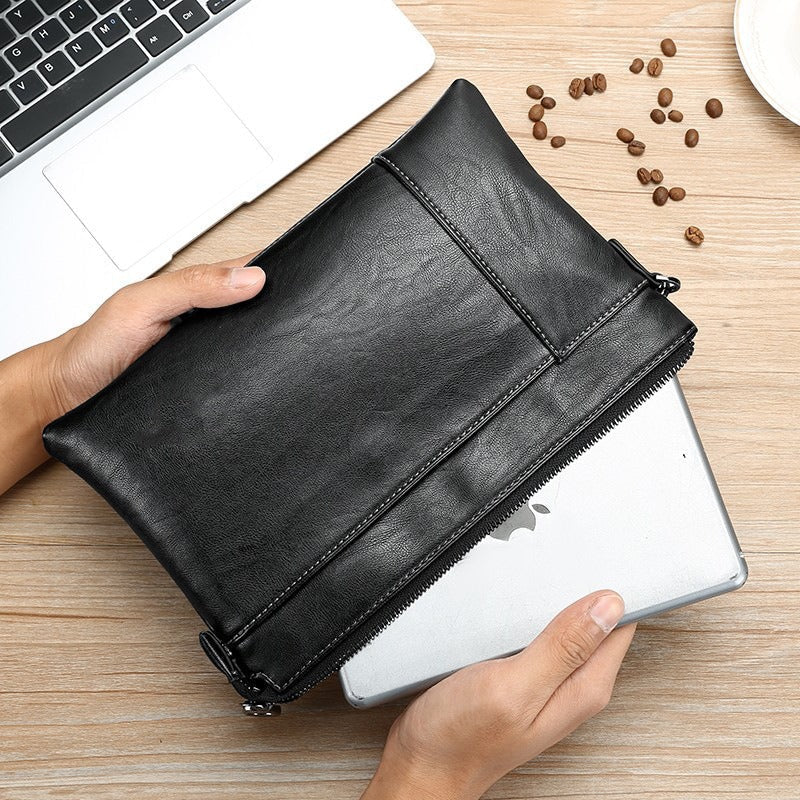 Pochette en cuir à dragonne au chic discret homme – La Tour-d'Aigues
