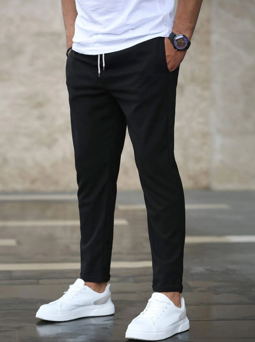 Pantalon taille élastique à cordon coupe fuselée noir homme, vue de face