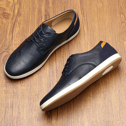 Paire de baskets effet cuir