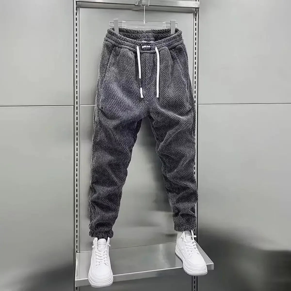 Pantalon de jogging fuselé à bas boutonnés