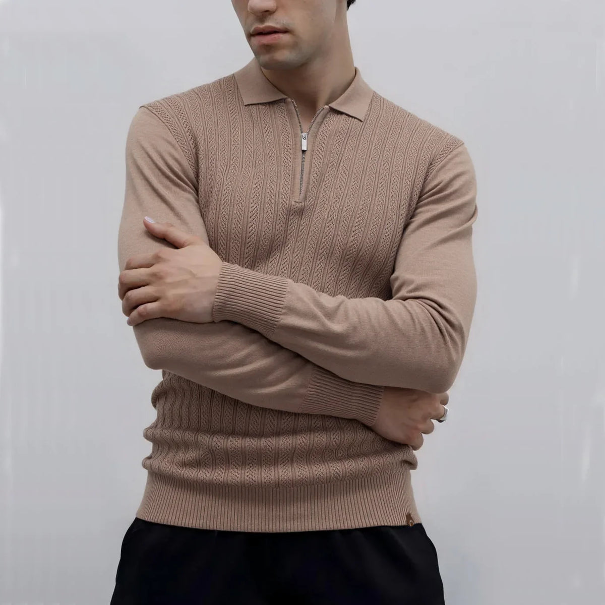 Polo texturé à col zippé