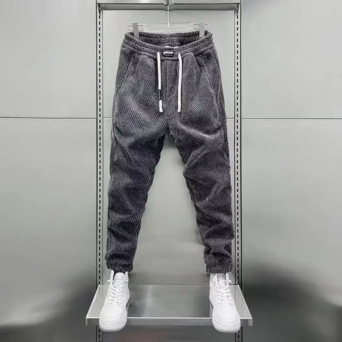 Pantalon de jogging fuselé à bas boutonnés