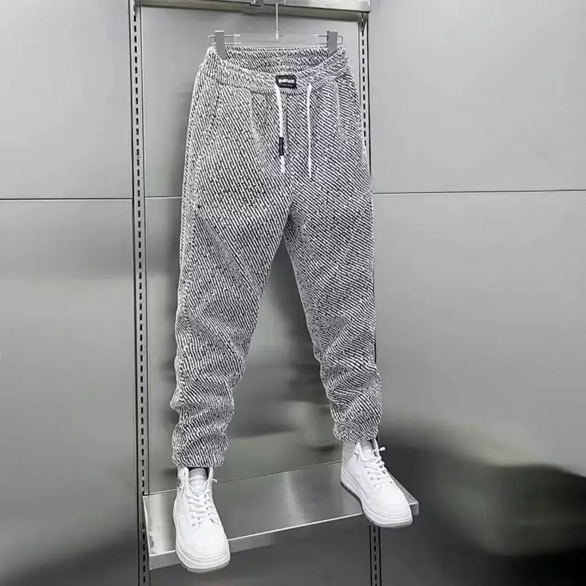Pantalon de jogging fuselé à bas boutonnés