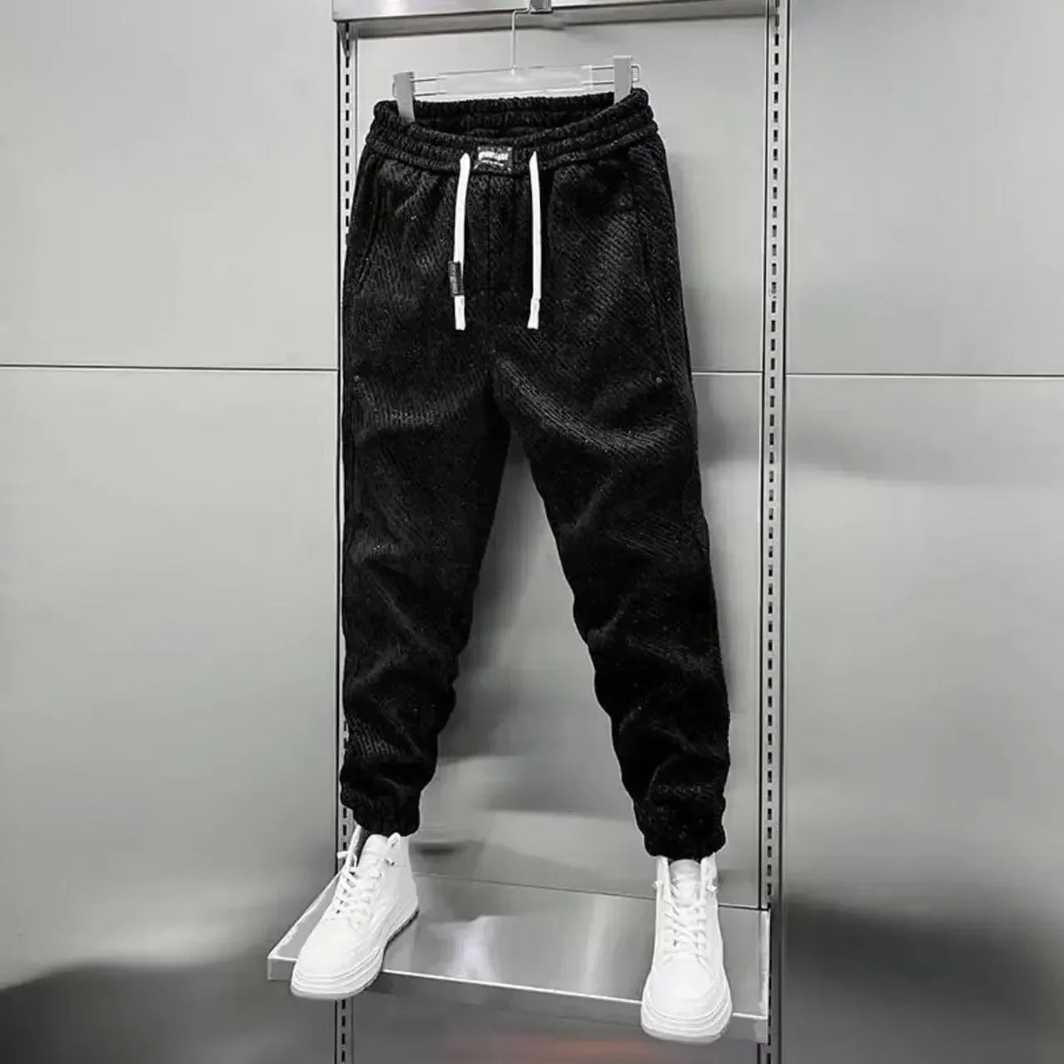 Pantalon de jogging fuselé à bas boutonnés