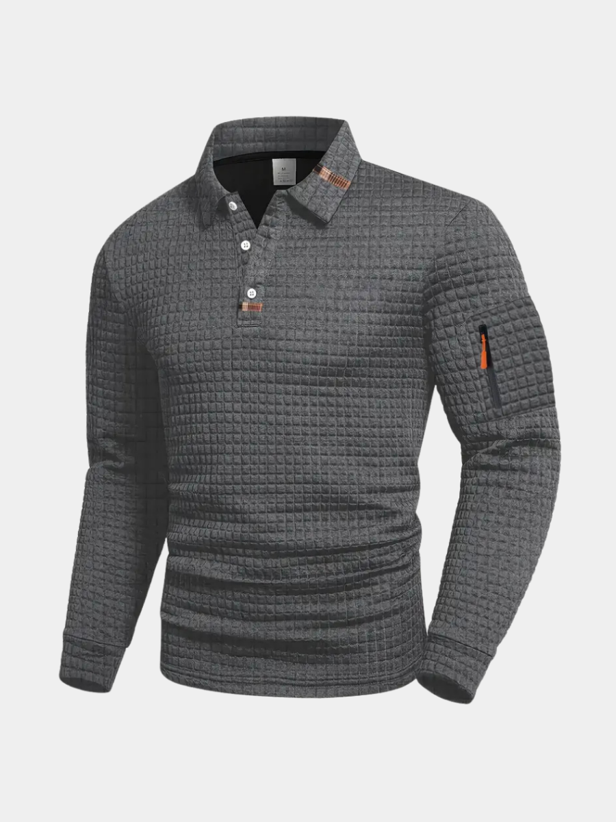 Polo manches longues texturé à poche zippée
