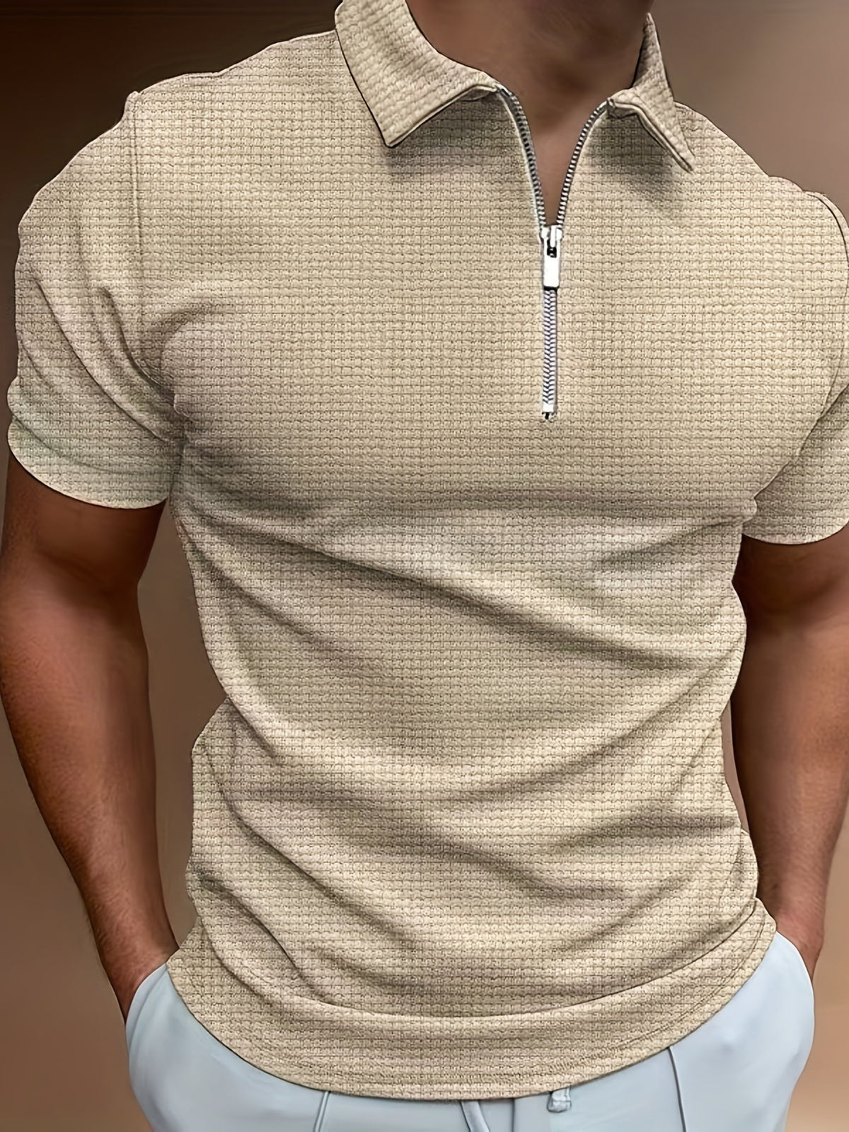 Polo zippé manches courtes maille texturée