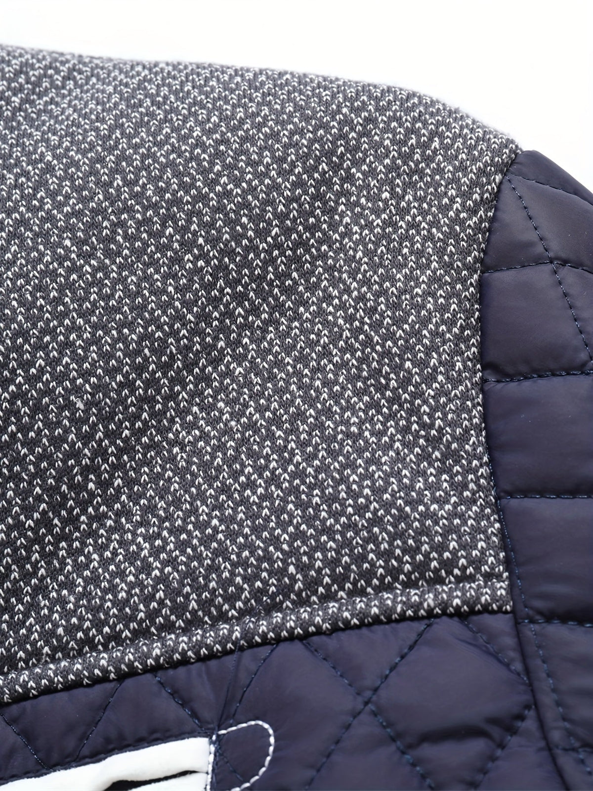 Doudoune courte matelassée col montant empiècements en maille homme – Lectoure