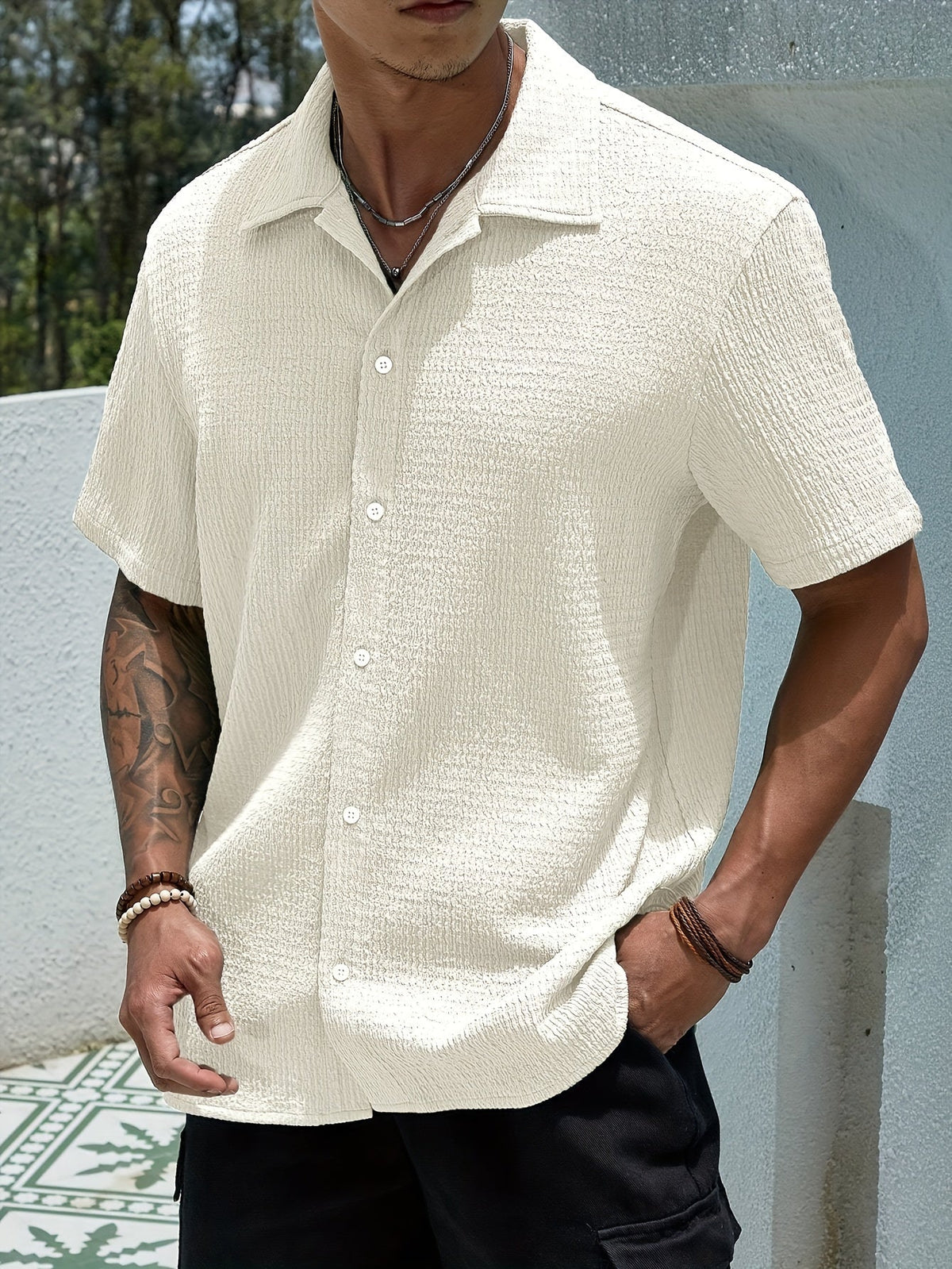 Chemise unie à col classique boutonnée