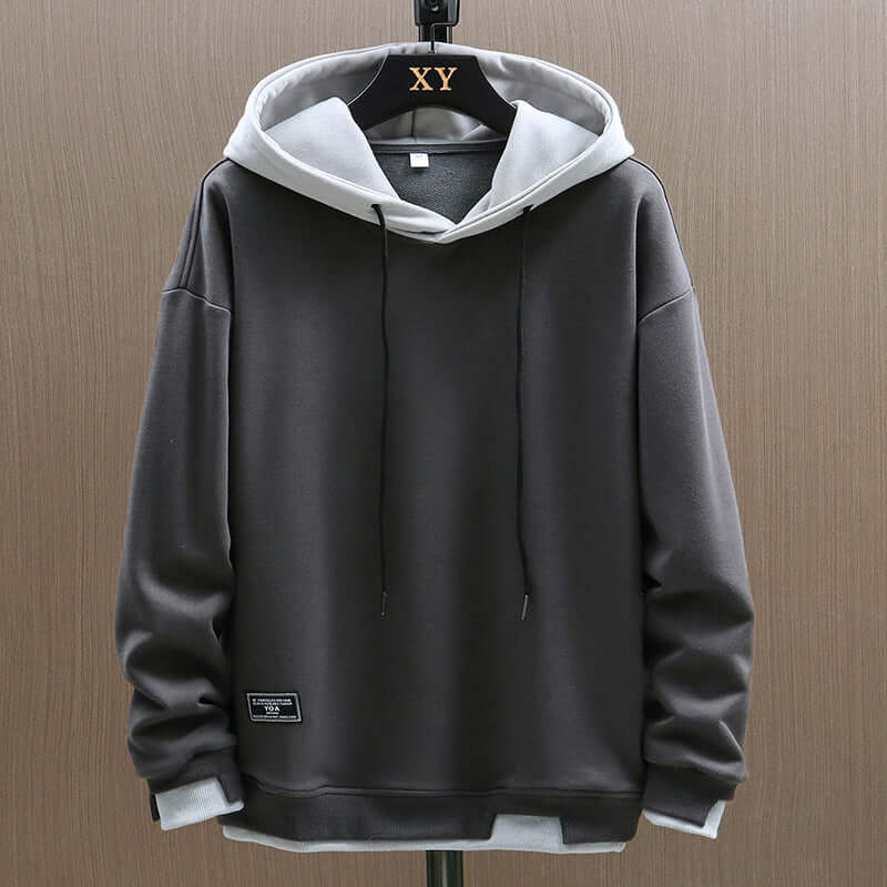 Sweat à capuche bicolore avec cordons