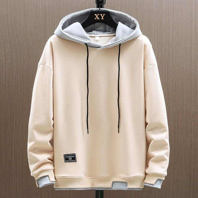 Sweat à capuche bicolore avec cordons